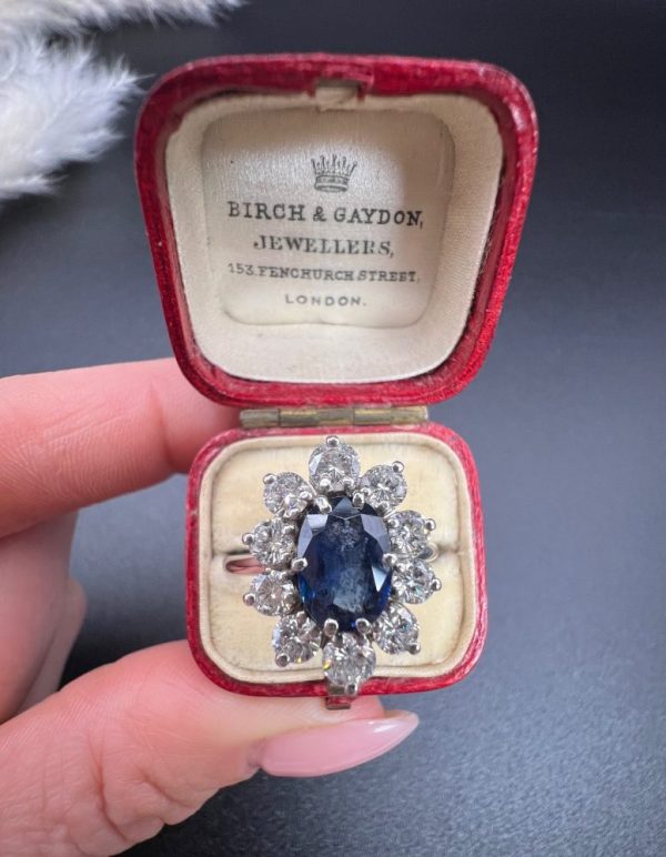 Sapphire and diamond cluster ring in white gold.