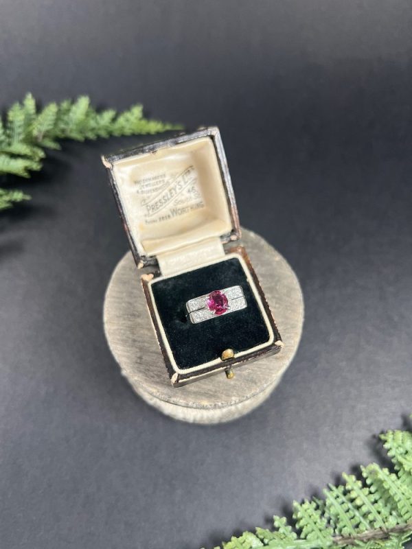 Vintage diamond and ruby cocktail ring in white gold.