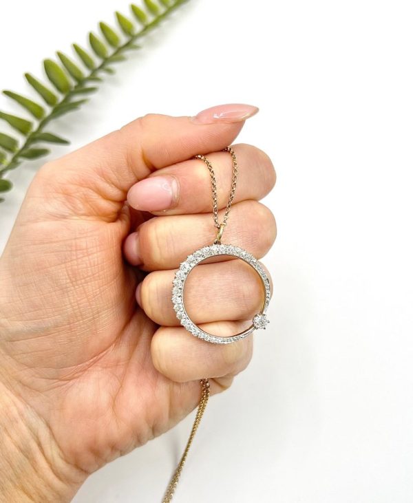 Edwardian diamond crescent moon pendant in white gold.