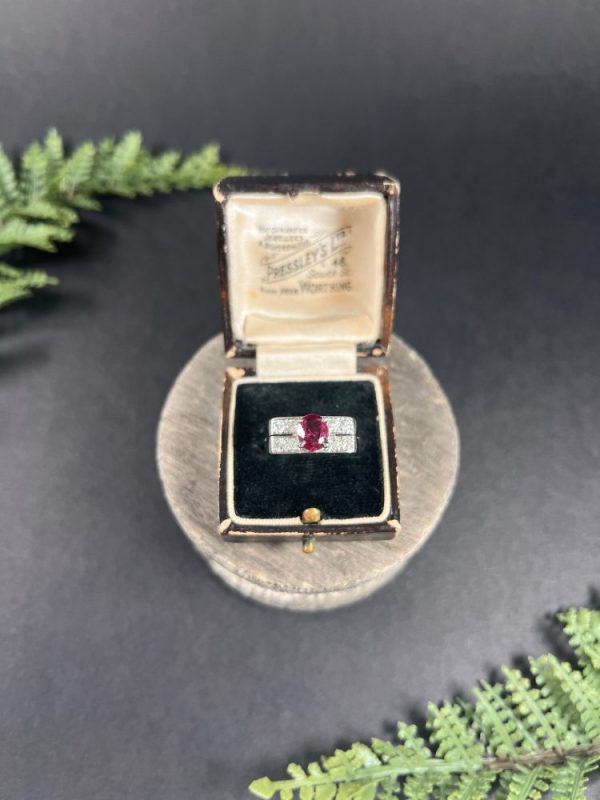 Vintage diamond and ruby cocktail ring in white gold.