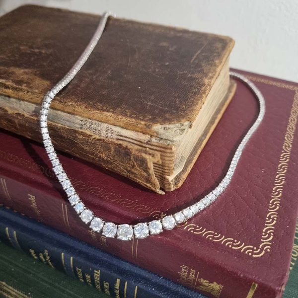 Diamond Line Tennis Necklace, 10.52 carats of graduated round brilliant-cut diamonds four-claw set and mounted in 18ct white gold