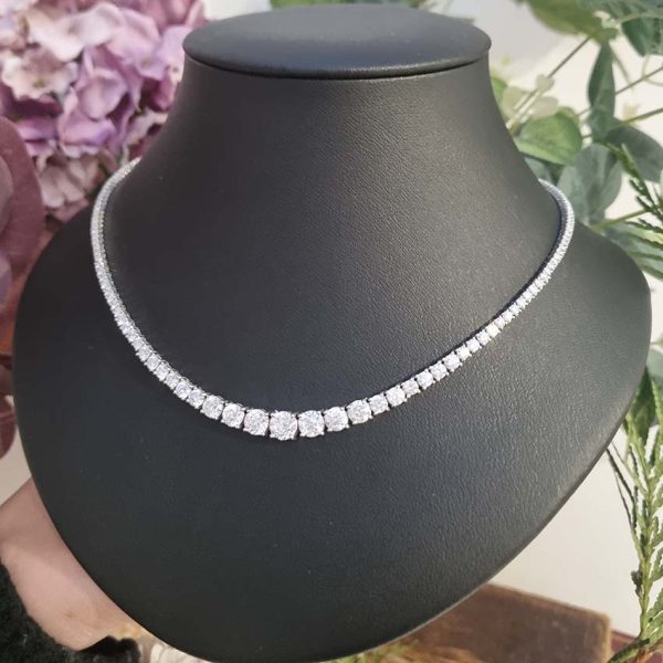 Diamond Line Tennis Necklace, 10.52 carats of graduated round brilliant-cut diamonds four-claw set and mounted in 18ct white gold