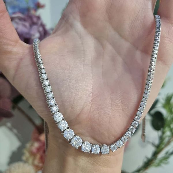Diamond Line Tennis Necklace, 10.52 carats of graduated round brilliant-cut diamonds four-claw set and mounted in 18ct white gold