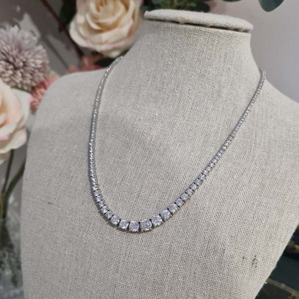 Diamond Line Tennis Necklace, 10.52 carats of graduated round brilliant-cut diamonds four-claw set and mounted in 18ct white gold