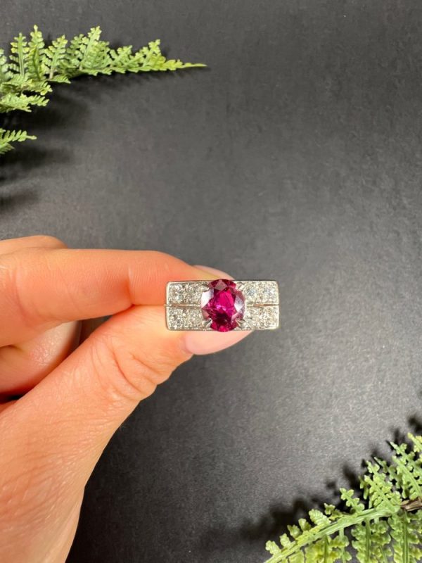 Vintage diamond and ruby cocktail ring in white gold.