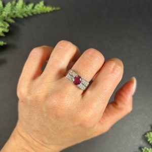 Vintage diamond and ruby cocktail ring in white gold.