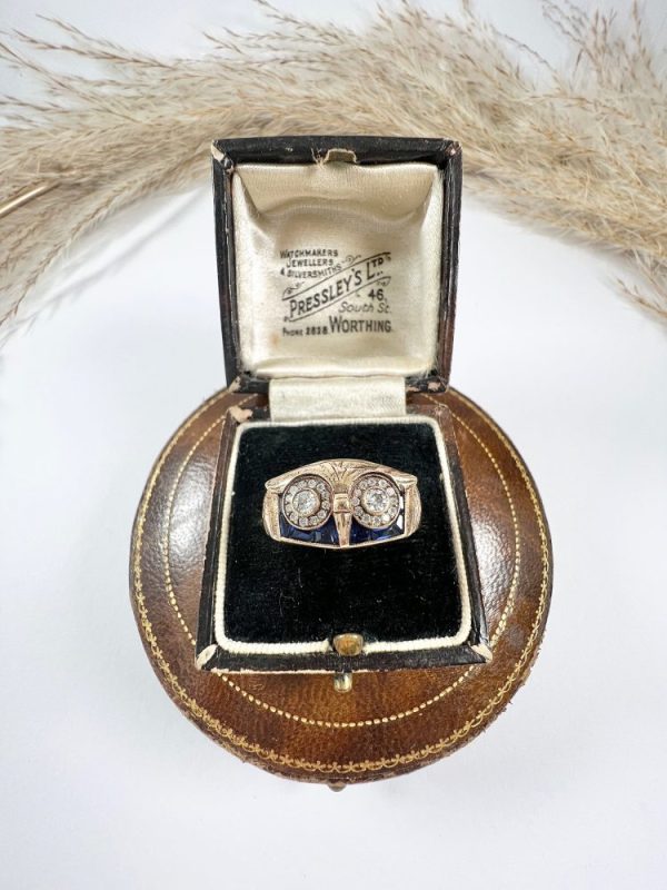 Vintage owl cocktail ring in rose gold with diamonds and sapphires.