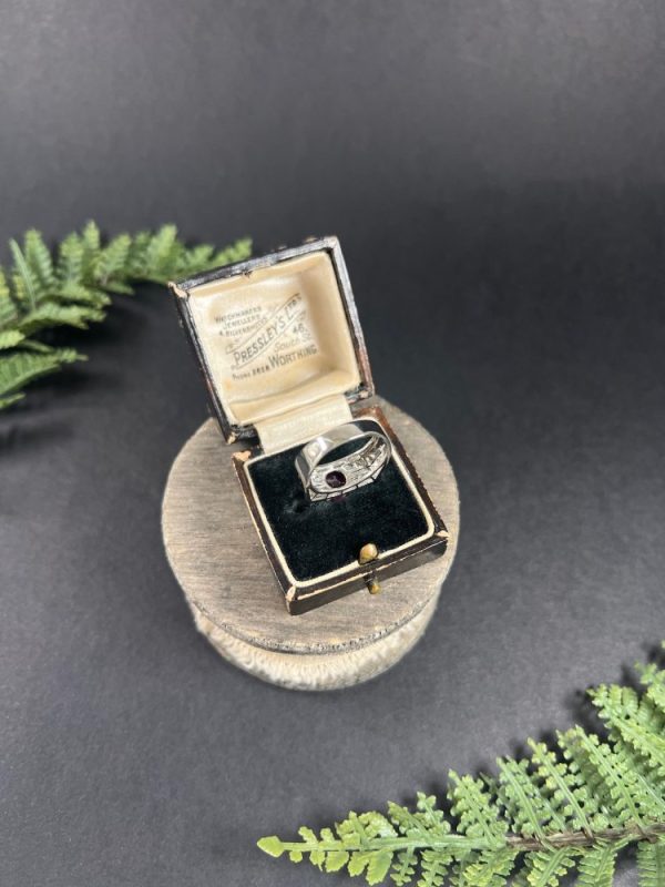 Vintage diamond and ruby cocktail ring in white gold.