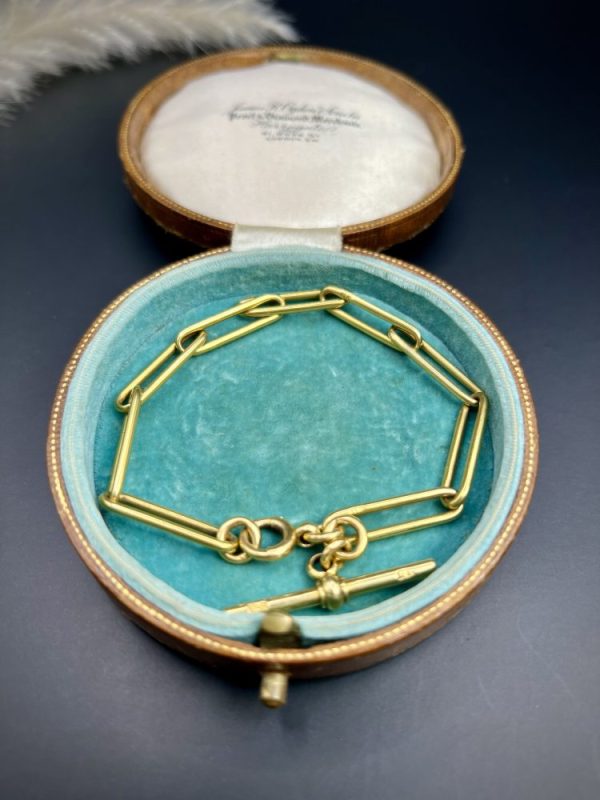 Edwardian trombone link bracelet in gold.