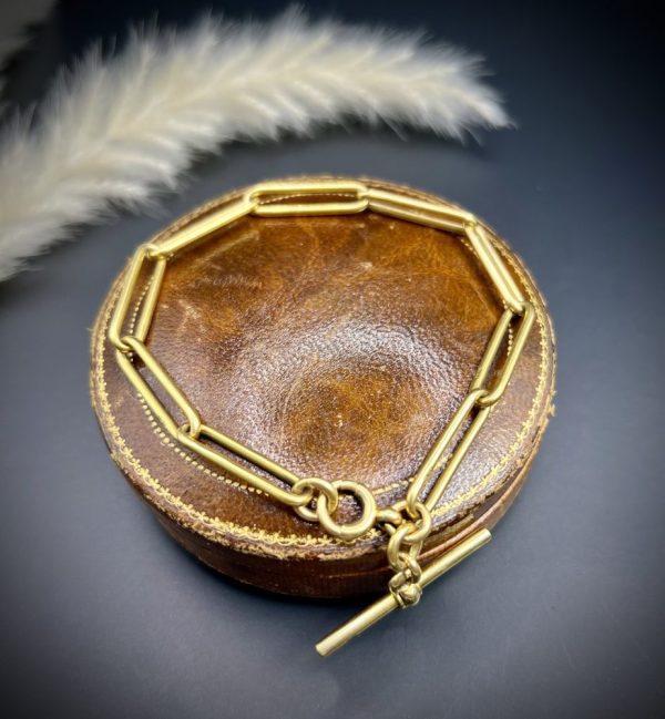 Edwardian trombone link bracelet in gold.