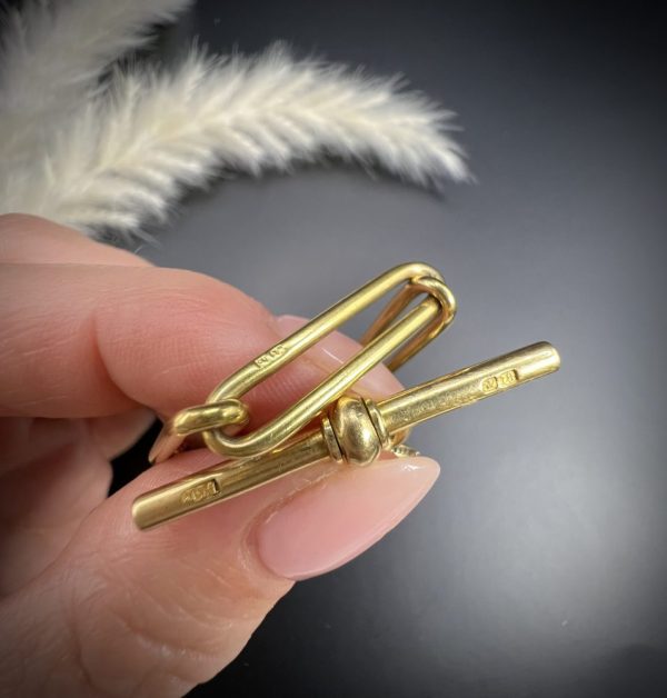 Edwardian trombone link bracelet in gold.