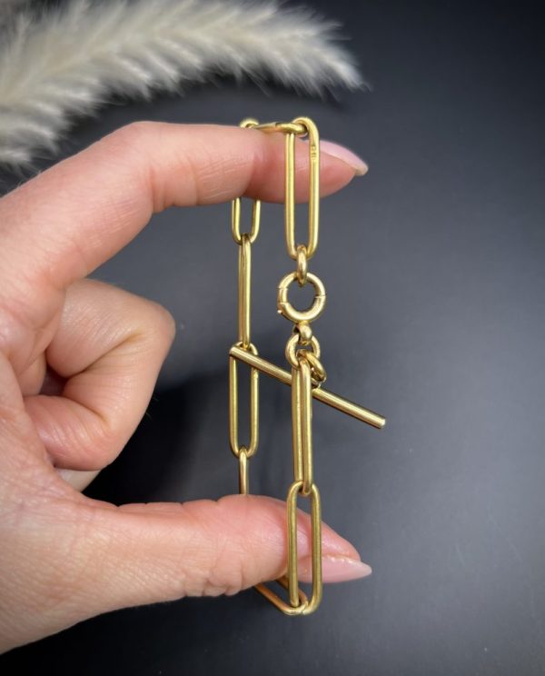 Edwardian trombone link bracelet in gold.