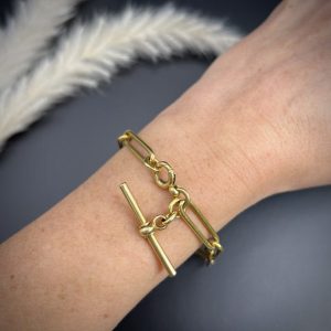 Edwardian trombone link bracelet in gold.