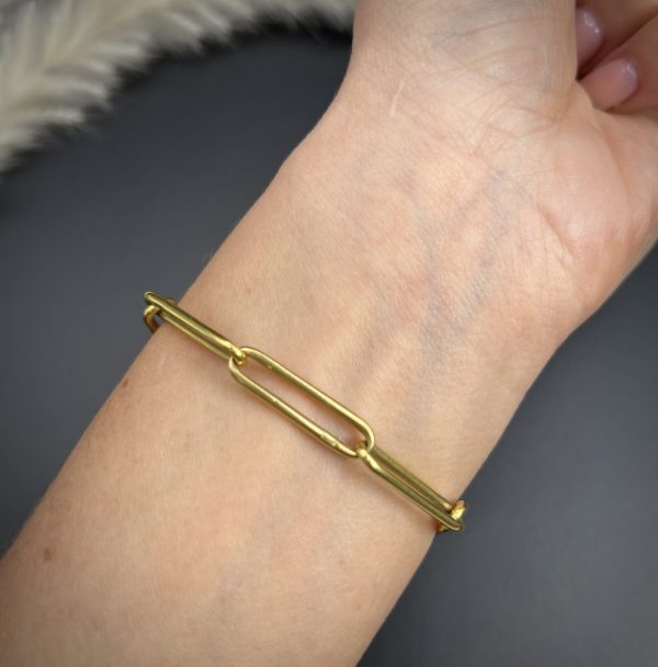 Edwardian trombone link bracelet in gold.