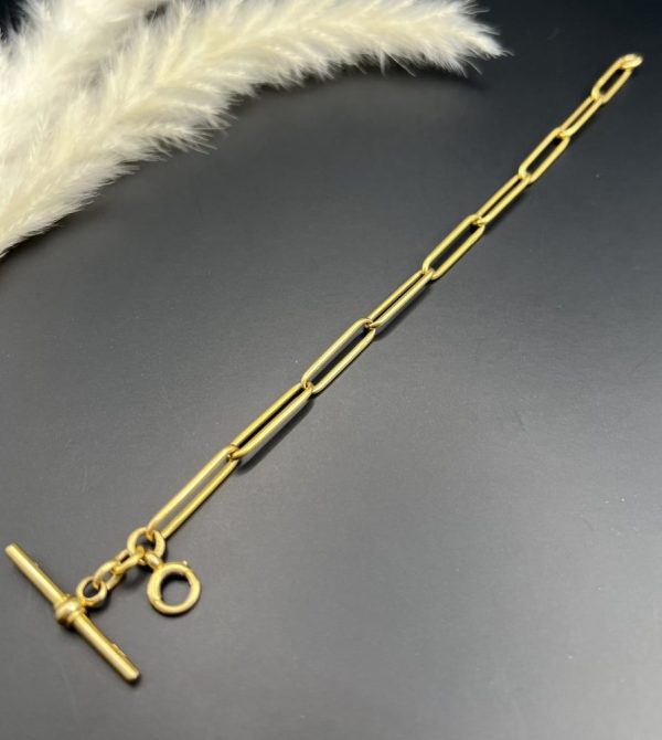 Edwardian trombone link bracelet in gold.