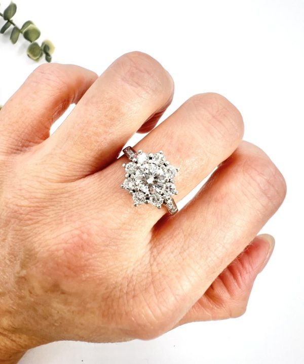 Diamond daisy cluster ring in platinum.