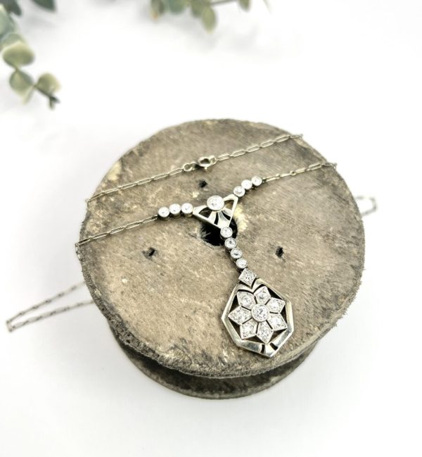 Antique diamond pendant necklace in platinum.