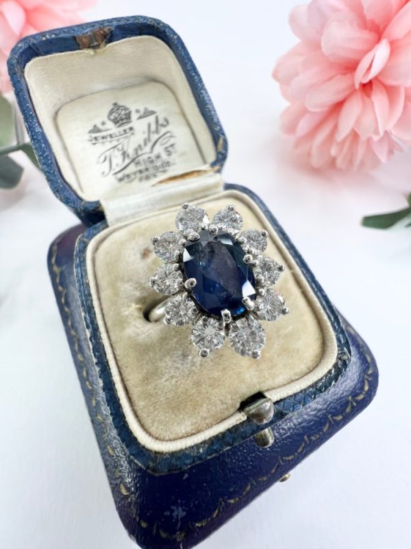 Sapphire and diamond cluster ring in white gold.