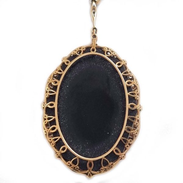 Antique Onyx and Rock Crystal Intaglio Pendant on Seed Pearl Sautoir Necklace, long geometric strung seed pearls suspends oval black onyx and rock crystal intaglio pendant featuring two winged cherubs holding aloft  flowers in an urn