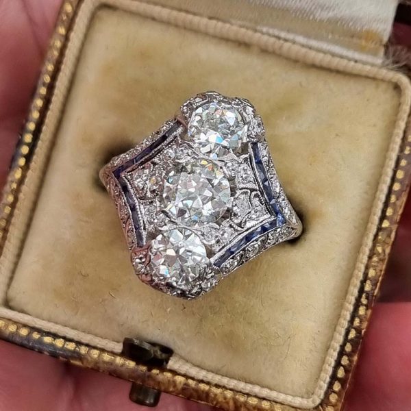 Antique Art Deco Edwardian diamond and Sapphire dinner ring, the eye catching cocktail ring set with old cut diamonds in platinum, milliegrain setting 1920s