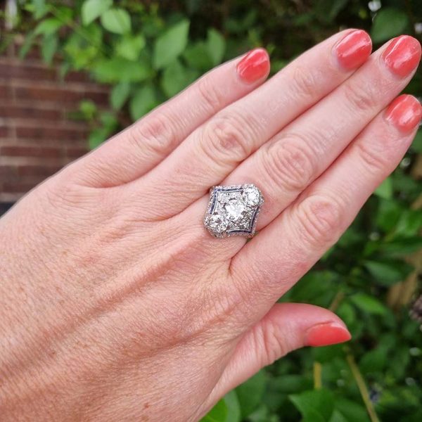 Antique Art Deco Edwardian diamond and Sapphire dinner ring, the eye catching cocktail ring set with old cut diamonds in platinum, milliegrain setting 1920s