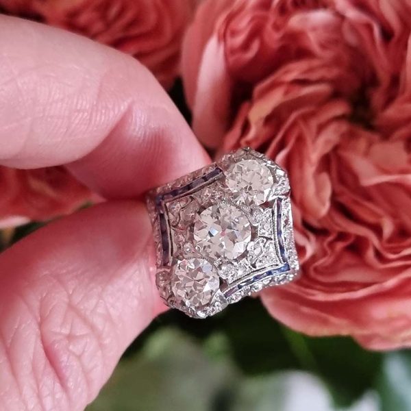 Antique Art Deco Edwardian diamond and Sapphire dinner ring, the eye catching cocktail ring set with old cut diamonds in platinum, milliegrain setting 1920s