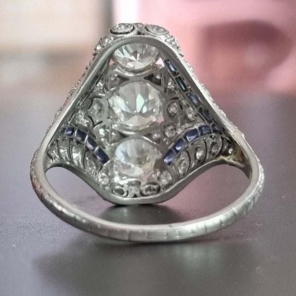 Antique Art Deco Edwardian diamond and Sapphire dinner ring, the eye catching cocktail ring set with old cut diamonds in platinum, milliegrain setting 1920s