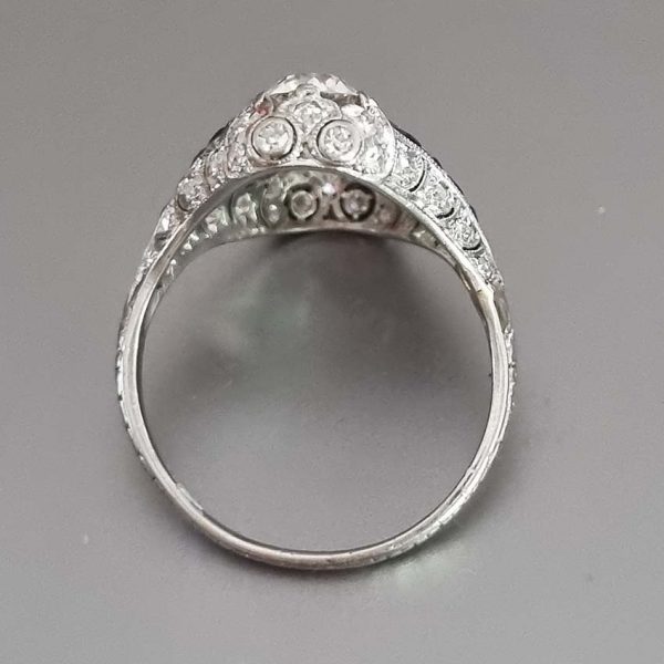 Antique Art Deco Edwardian diamond and Sapphire dinner ring, the eye catching cocktail ring set with old cut diamonds in platinum, millegrain setting 1920s