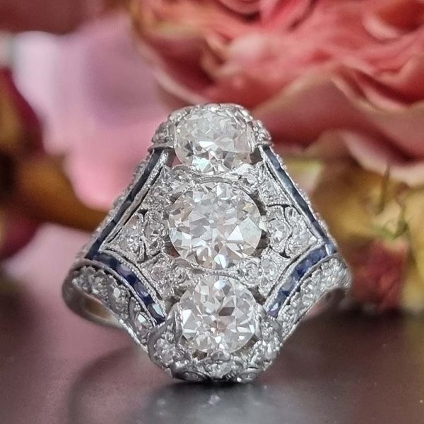 Antique Art Deco Edwardian diamond and Sapphire dinner ring, the eye catching cocktail ring set with old cut diamonds in platinum, milliegrain setting 1920s