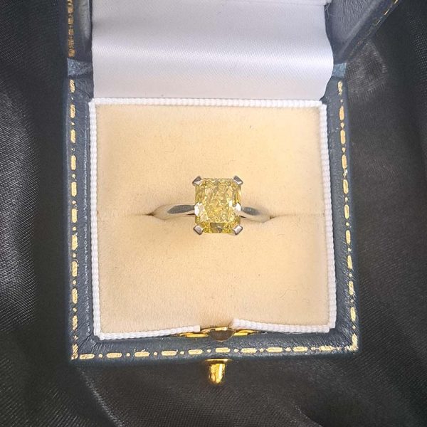 GIA Internally Flawless 3.23ct Fancy Intense Yellow Diamond Solitaire Engagement Ring in Platinum, single stone modified emerald-shaped step-cut fancy intense yellow natural diamond with GIA certificate 15074692