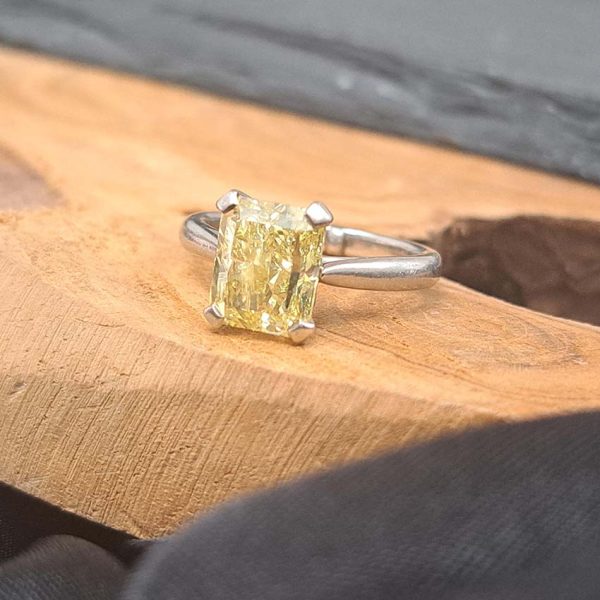 GIA Internally Flawless 3.23ct Fancy Intense Yellow Diamond Solitaire Engagement Ring in Platinum, single stone modified emerald-shaped step-cut fancy intense yellow natural diamond with GIA certificate 15074692