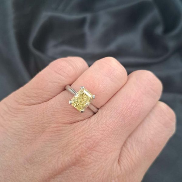 GIA Internally Flawless 3.23ct Fancy Intense Yellow Diamond Solitaire Engagement Ring in Platinum, single stone modified emerald-shaped step-cut fancy intense yellow natural diamond with GIA certificate 15074692