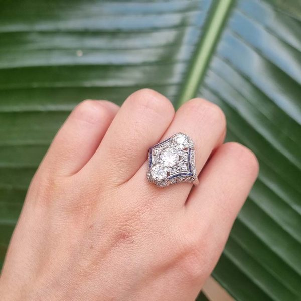 Antique Art Deco Edwardian diamond and Sapphire dinner ring, the eye catching cocktail ring set with old cut diamonds in platinum, milliegrain setting 1920s