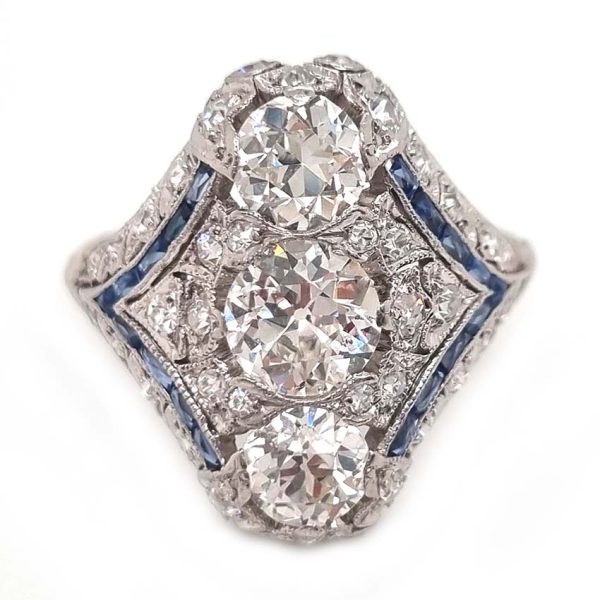 Antique Art Deco Edwardian diamond and Sapphire dinner ring, the eye catching cocktail ring set with old cut diamonds in platinum, milliegrain setting 1920s