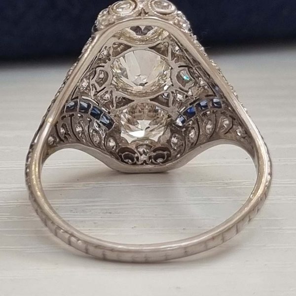 Antique Art Deco Edwardian diamond and Sapphire dinner ring, the eye catching cocktail ring set with old cut diamonds in platinum, millegrain setting 1920s