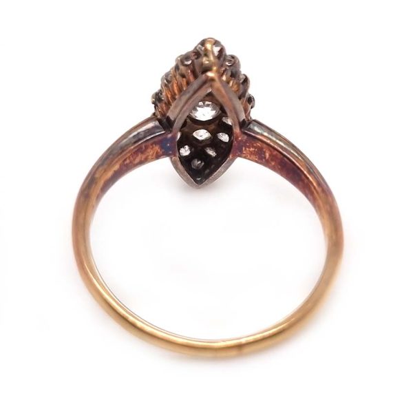Victorian Antique Old Cut Diamond Navette Cluster Ring, composed of old mine-cut diamond arranged in an eye-catching navette shaped cluster in silver upon yellow gold. Circa 1860.