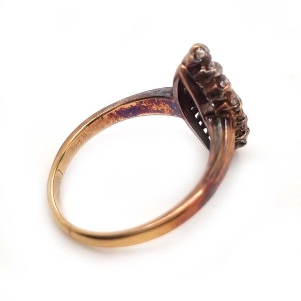 Victorian Antique Old Cut Diamond Navette Cluster Ring, composed of old mine-cut diamond arranged in an eye-catching navette shaped cluster in silver upon yellow gold. Circa 1860.