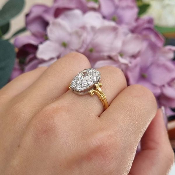Antique Cushion Old Cut Diamond Cluster Plaque Tablet Ring, 1.08ct cushion-shaped old-cut diamond surrounded by 1.23cts old mine-cut diamonds in platinum to 18ct yellow gold, 2.31 carat total
