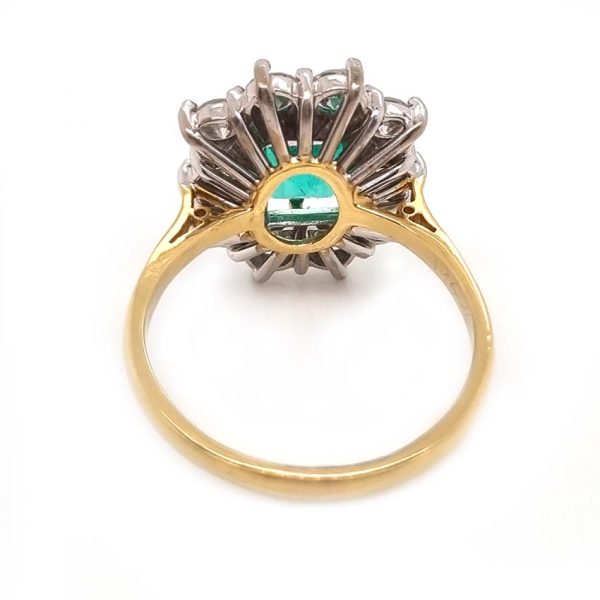 Vintage 2.91ct Emerald and Diamond Cluster Engagement Ring, 2.91ct emerald-cut emerald surrounded by 1.50 carats of sparkling round brilliant-cut diamonds in 18ct yellow gold