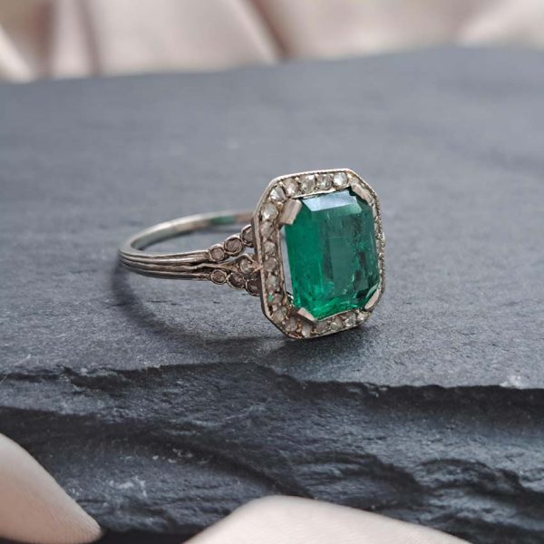 Art Deco 1.54ct Colombian Emerald and Rose Cut Diamond Cluster Engagement Ring in Platinum, verbal from laboratory of Colombian origin with moderate resin