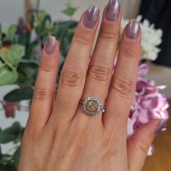Antique 1.17ct Old Mine Cut Yellow Diamond Cluster Engagement Ring in Platinum, 1.17ct old mine-cut yellow diamond surrounded by halo of white diamonds