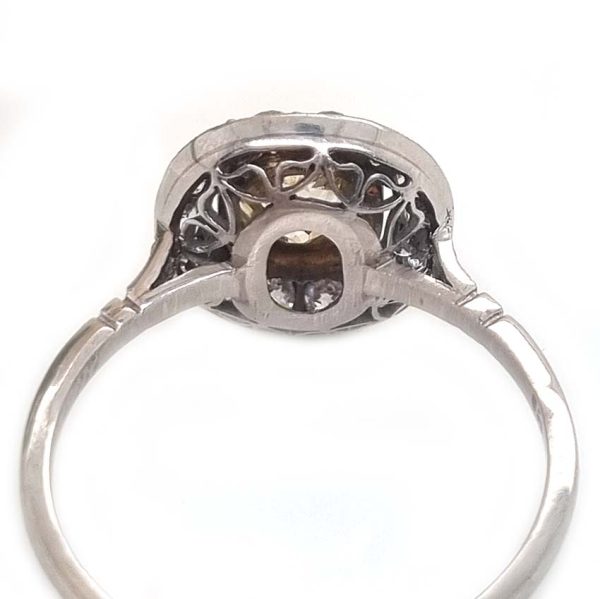 Antique 1.17ct Old Mine Cut Yellow Diamond Cluster Engagement Ring in Platinum, 1.17ct old mine-cut yellow diamond surrounded by halo of white diamonds