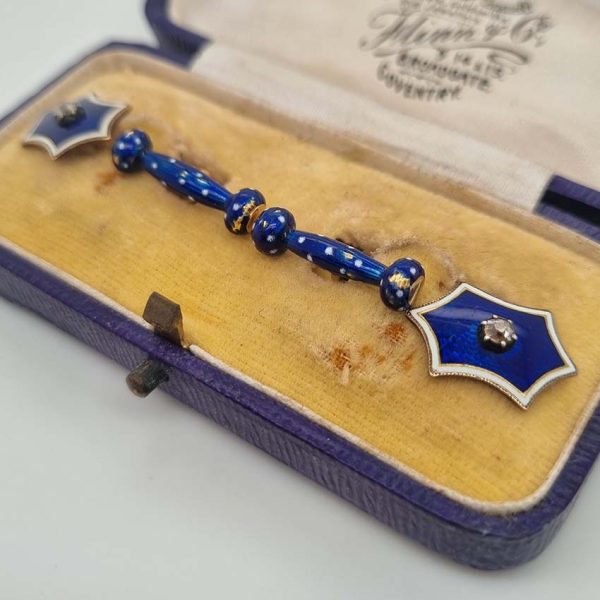 Edwardian Antique Blue Enamel and Diamond Cufflinks, fine six-pointed stars blue enamel central old mine-cut diamond white enamel border to fancy baton shaped fasteners decorated with blue enamel with white enamel polka dots accents in 18ct yellow gold