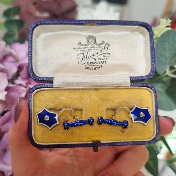 Edwardian Antique Blue Enamel and Diamond Cufflinks, fine six-pointed stars blue enamel central old mine-cut diamond white enamel border to fancy baton shaped fasteners decorated with blue enamel with white enamel polka dots accents in 18ct yellow gold