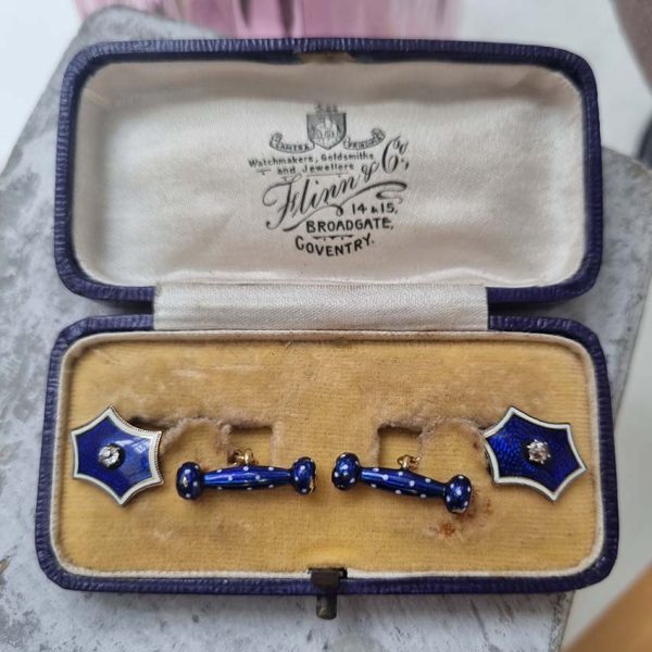 Edwardian Antique Blue Enamel and Diamond Cufflinks, fine six-pointed stars blue enamel central old mine-cut diamond white enamel border to fancy baton shaped fasteners decorated with blue enamel with white enamel polka dots accents in 18ct yellow gold