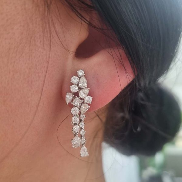 Vintage Diamond Spray Drop Earrings, set with an array of brilliant, pear and square princess-cut diamonds in 18ct white gold