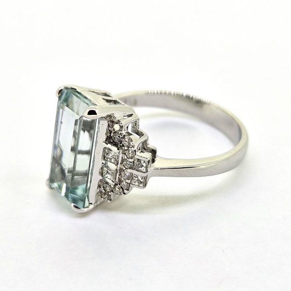 3.75ct Aquamarine Ring with Stepped Diamond Shoulders, 3.75ct baguette rectangular step cut aquamarine flanked by diamond-set stepped shoulders in 18ct white gold