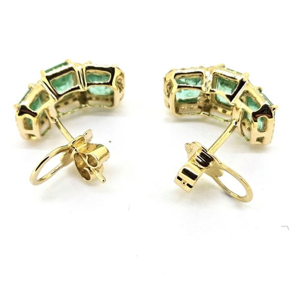 3.50ct Emerald and Diamond Cluster Half Hoop Huggie Earrings in 18ct Yellow Gold, three emerald-cut emeralds set horizontally in a line surrounded by sparkling diamonds