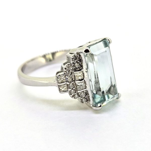 3.75ct Aquamarine Ring with Stepped Diamond Shoulders, 3.75ct baguette rectangular step cut aquamarine flanked by diamond-set stepped shoulders in 18ct white gold