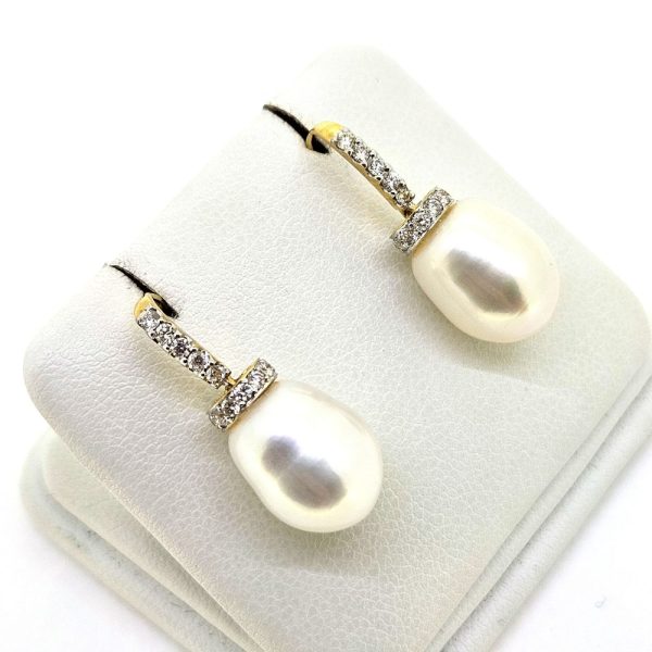 Pearl and Diamond Shepherd Hook Drop Earrings Freshwater pearl and diamond drop earrings on shepherds hooks in 18ct yellow gold